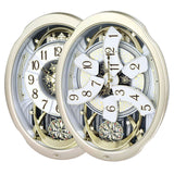 Rhythm Magic Motion Clock Rotating Pend - Gilt Rhythm